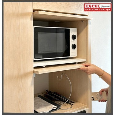 Flap door retracted into the cabinet above a microwave, with a pull-out shelf being drawn out below